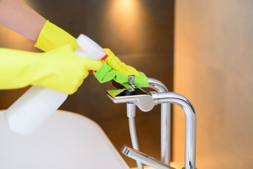 Commercial cleaners working in a Fulham office reception area