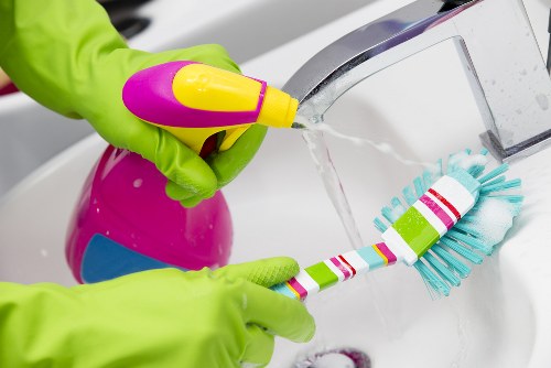 Local office cleaners working in a Fulham business building with careful access
