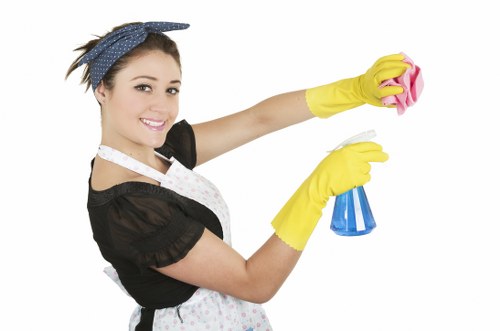 Technician wearing PPE during professional carpet cleaning in Fulham
