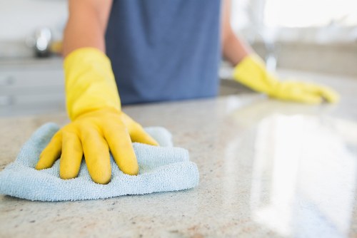 Upholstery cleaner treating a fabric sofa in Fulham